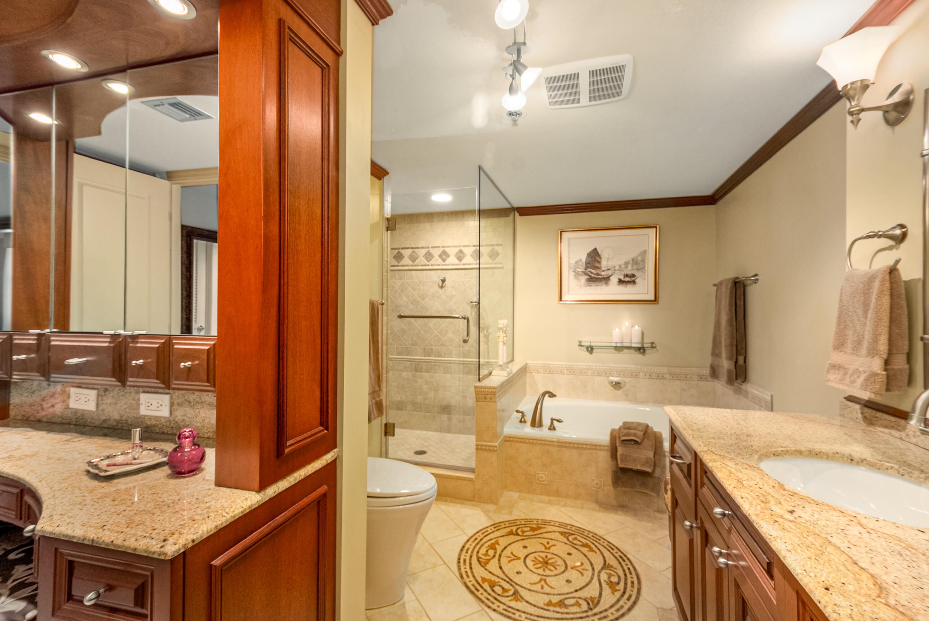 4748 South Ocean Boulevard, Unit 4B Highland Beach, FL 33487 - Photo 25 of 56 a bathroom with a granite countertop sink mirror vanity and bathtub