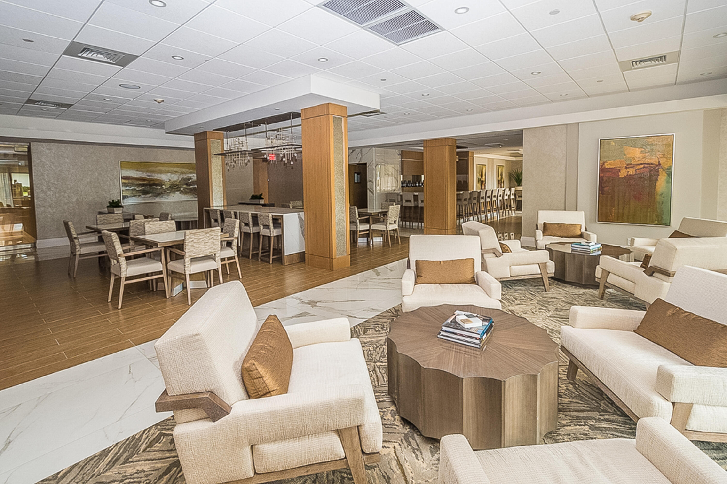4748 South Ocean Boulevard, Unit 4B Highland Beach, FL 33487 - Photo 35 of 56 a living room with furniture dining table and a large window