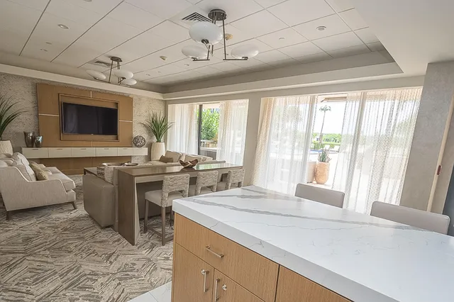 a view of a swimming pool with a patio