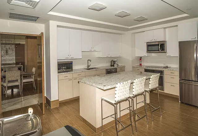 a swimming pool with outdoor seating and yard