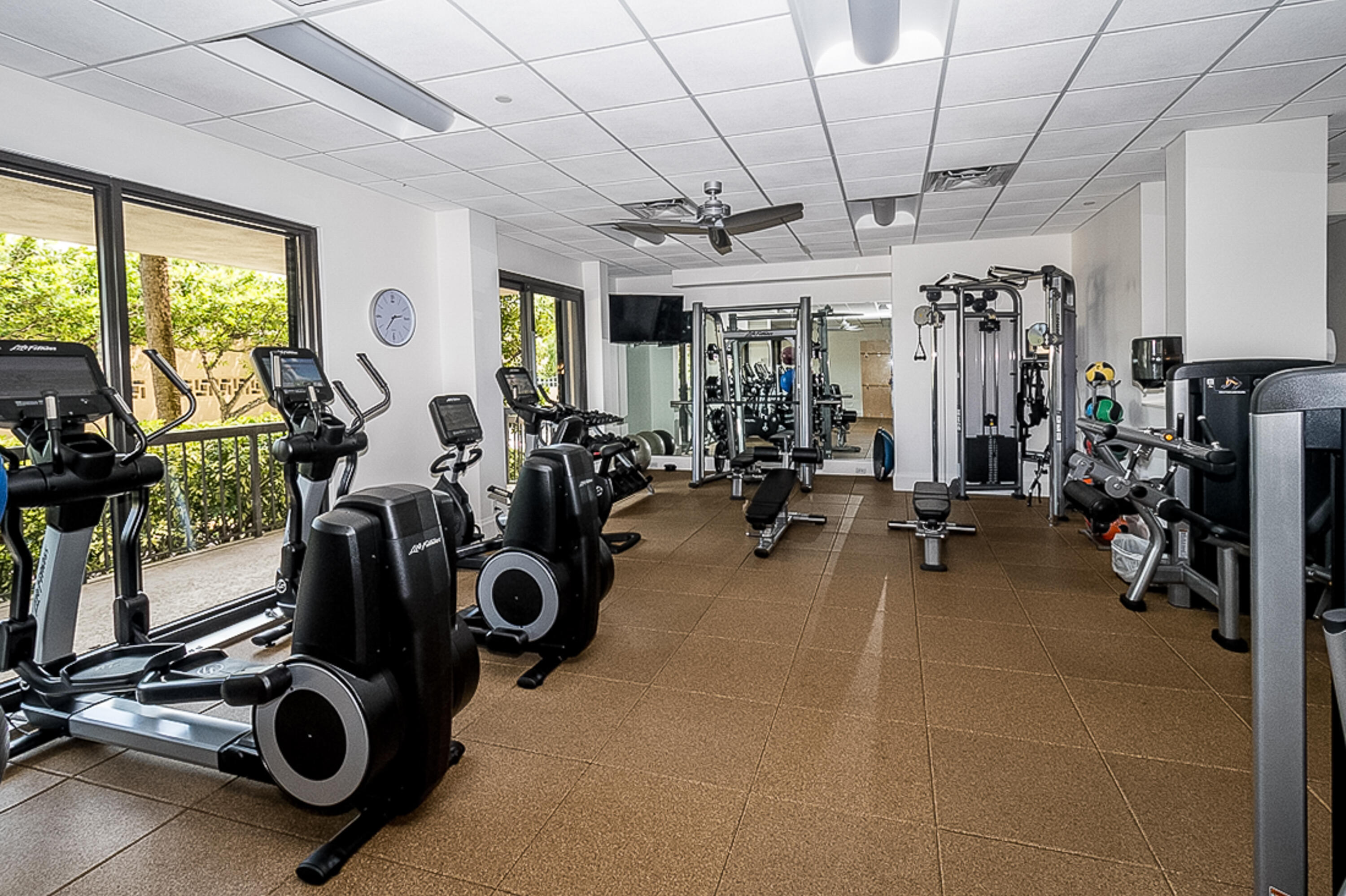 4748 South Ocean Boulevard, Unit 4B Highland Beach, FL 33487 - Photo 39 of 56 a view of a room with gym equipment