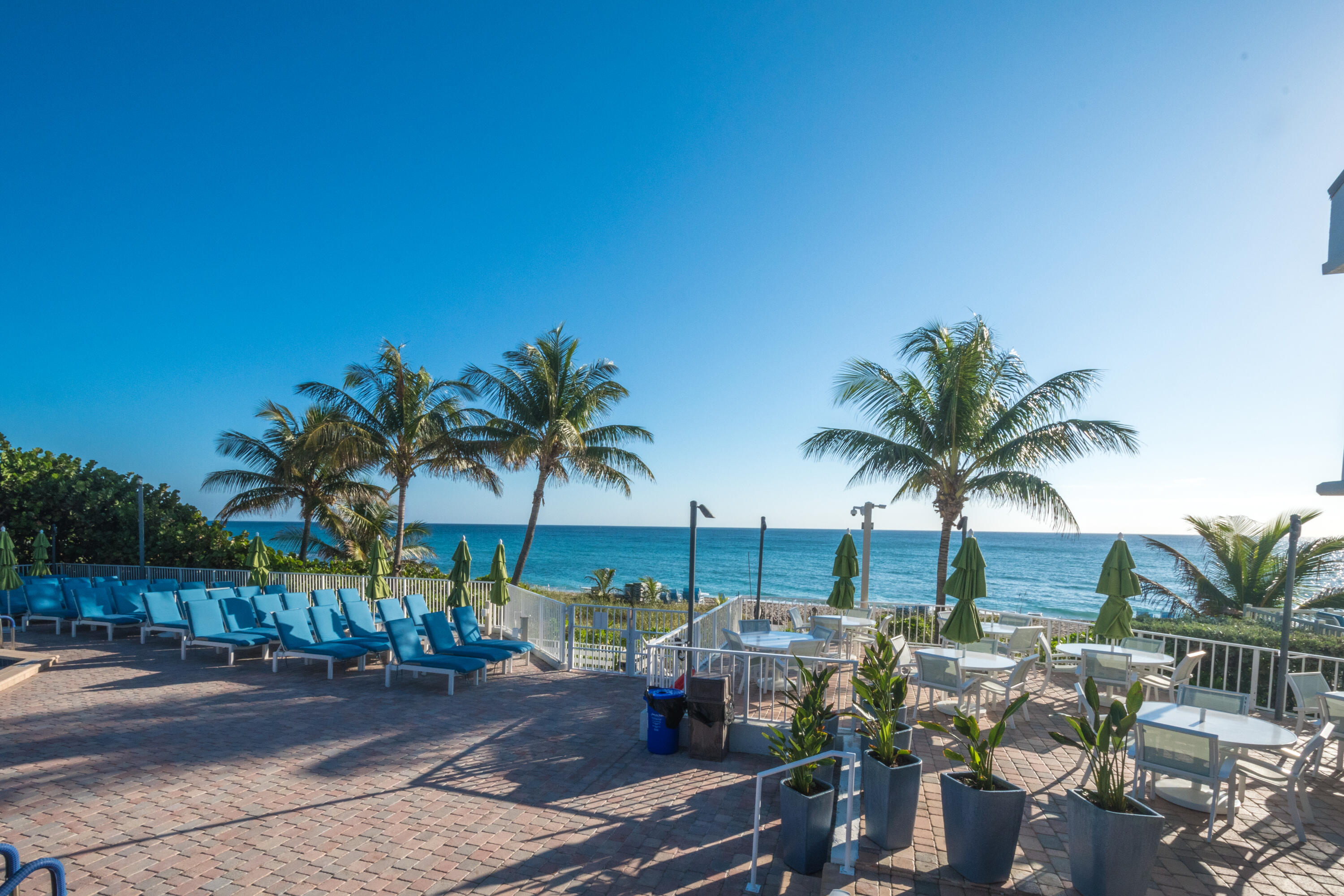 4748 South Ocean Boulevard, Unit 4B Highland Beach, FL 33487 - Photo 47 of 56 a view of a backyard with a patio