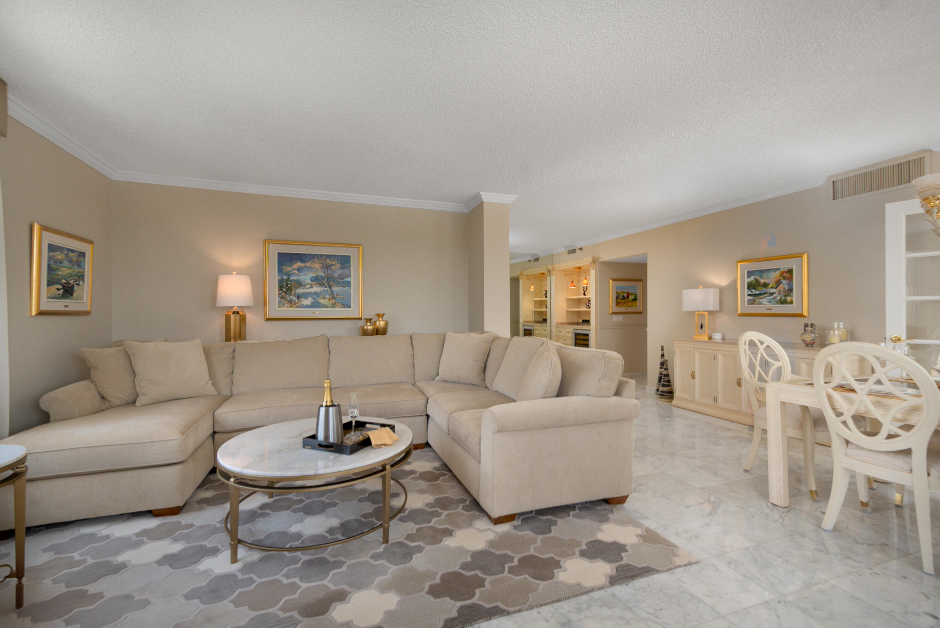 4748 South Ocean Boulevard, Unit 4B Highland Beach, FL 33487 - Photo 8 of 56 a living room with furniture and a table