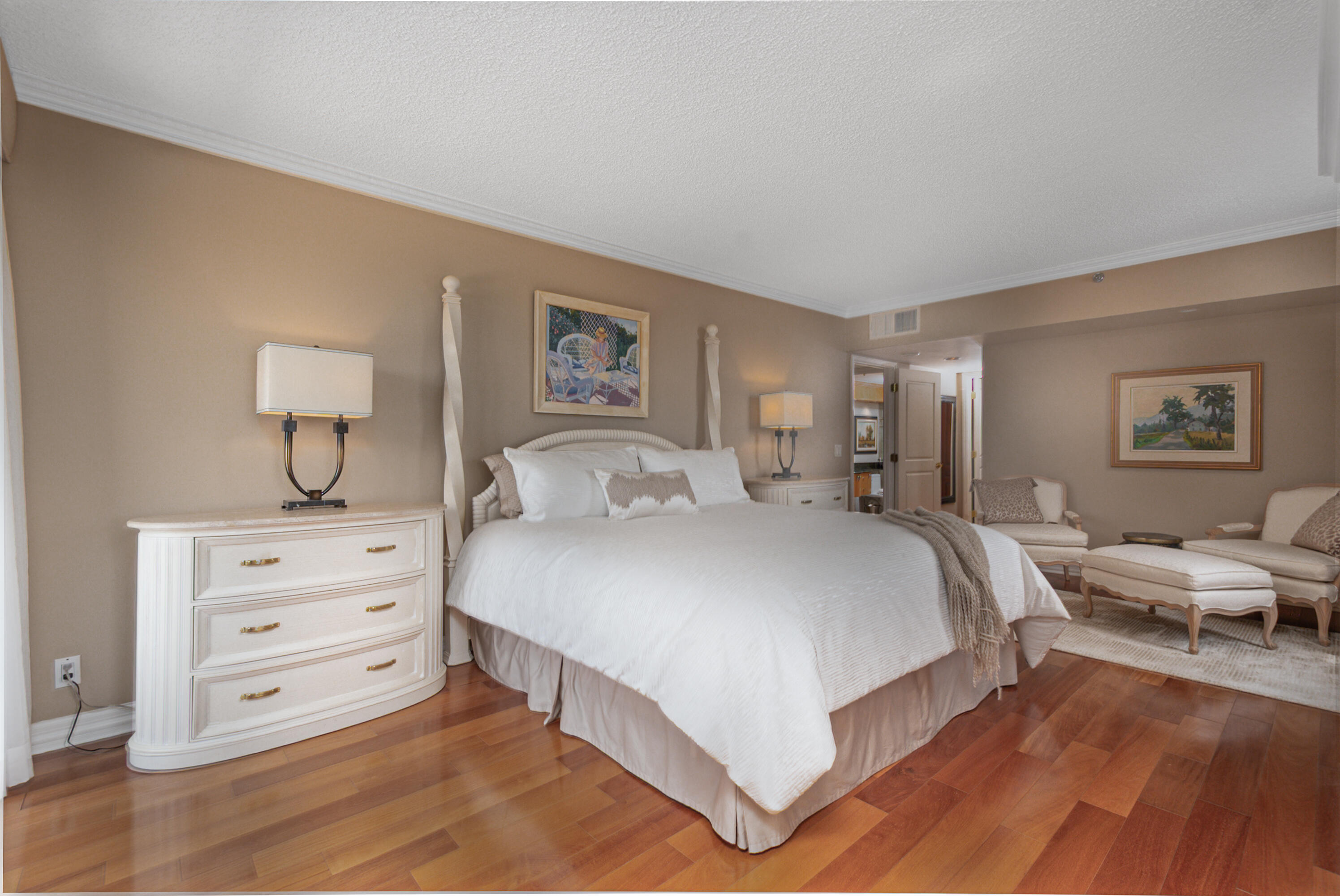 4748 South Ocean Boulevard, Unit 4B Highland Beach, FL 33487 - Photo 9 of 56 a spacious bedroom with a bed and a couch