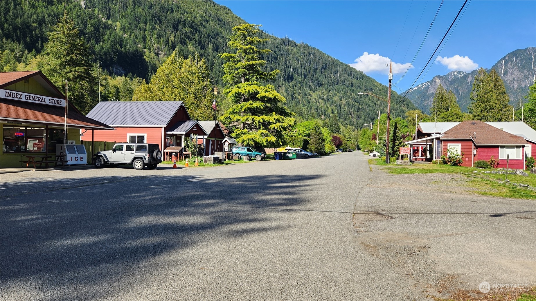 49235 Reiter Road Index, WA 98256 - Photo 28 of 31 a street view with tall buildings and a street sign