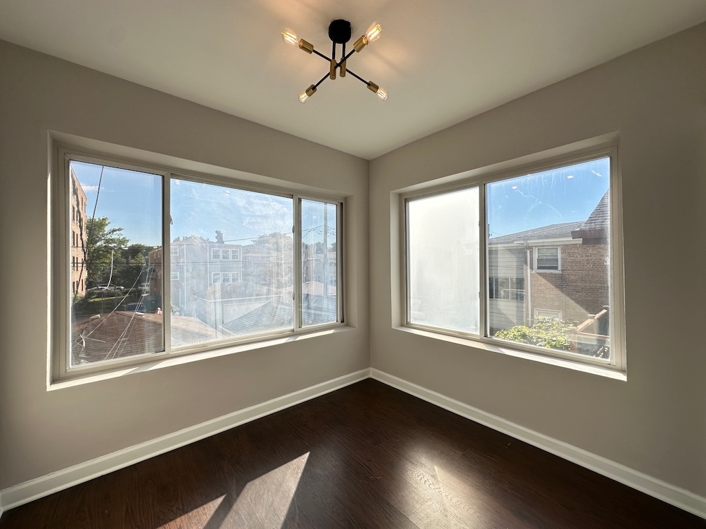 2617 West Rascher Avenue, Unit 2 Chicago, IL 60625 - Photo 18 of 20 a view of an empty room with a window