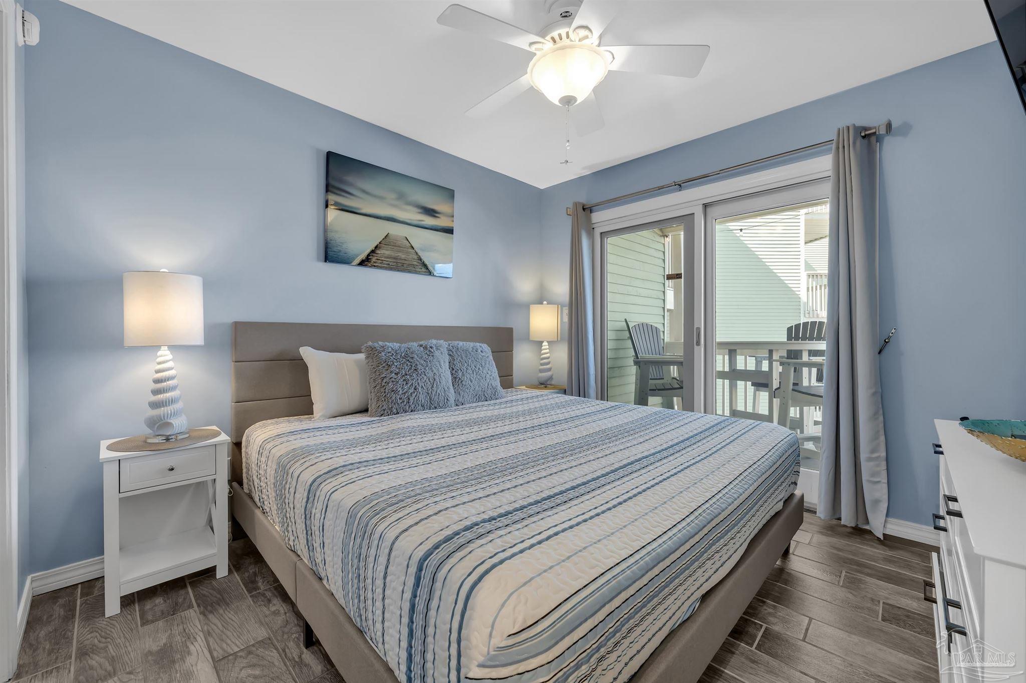 16310 Perdido Key Drive, Unit 9A Perdido Key, FL 32507 - Photo 11 of 26 a bedroom with a large bed and a window