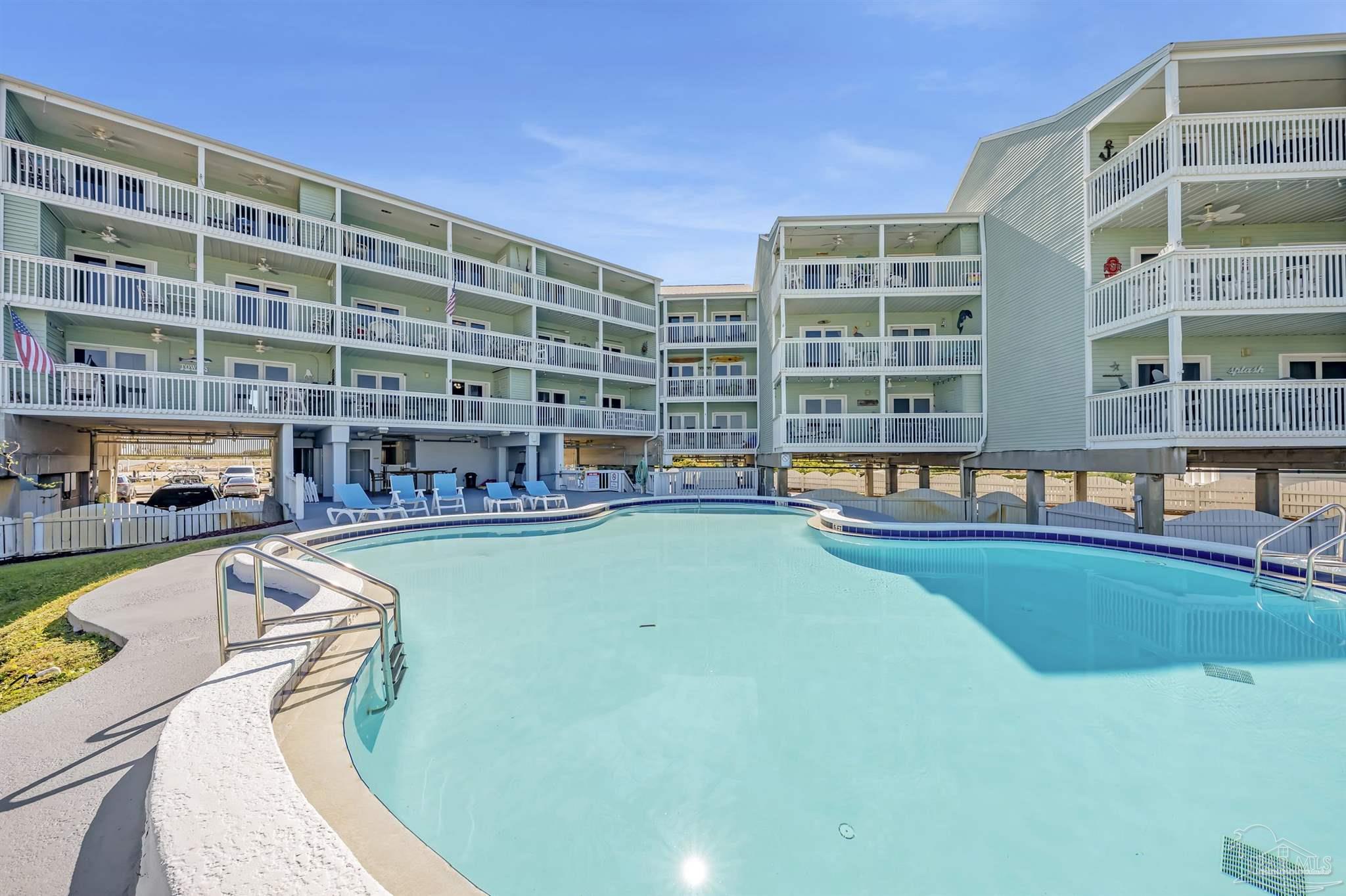 16310 Perdido Key Drive, Unit 9A Perdido Key, FL 32507 - Photo 17 of 26 a swimming pool with outdoor view and sitting area