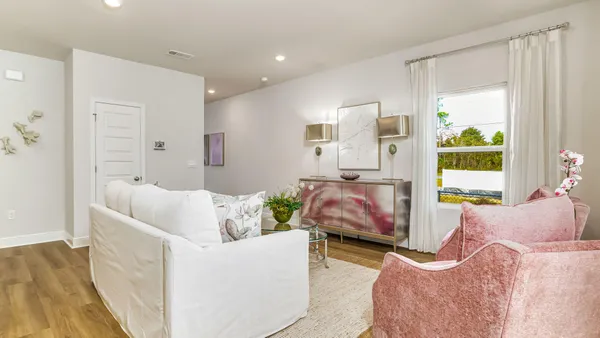 a living room with furniture and a couch