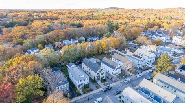 a view of city with tall buildings