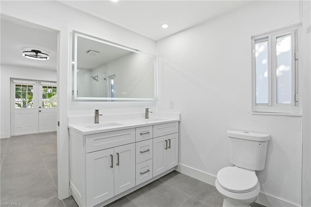 3929 Mohawk Place Naples, FL 34112 - Photo 24 of 47 Primary bathroom with dual sinks