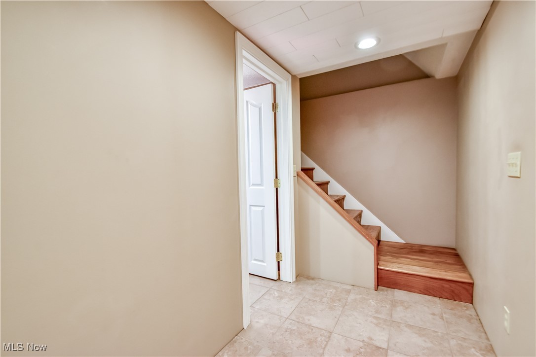 5618 Dolphin Road Mentor, OH 44060 - Photo 30 of 46 Stairs featuring tile patterned floors and recessed lighting