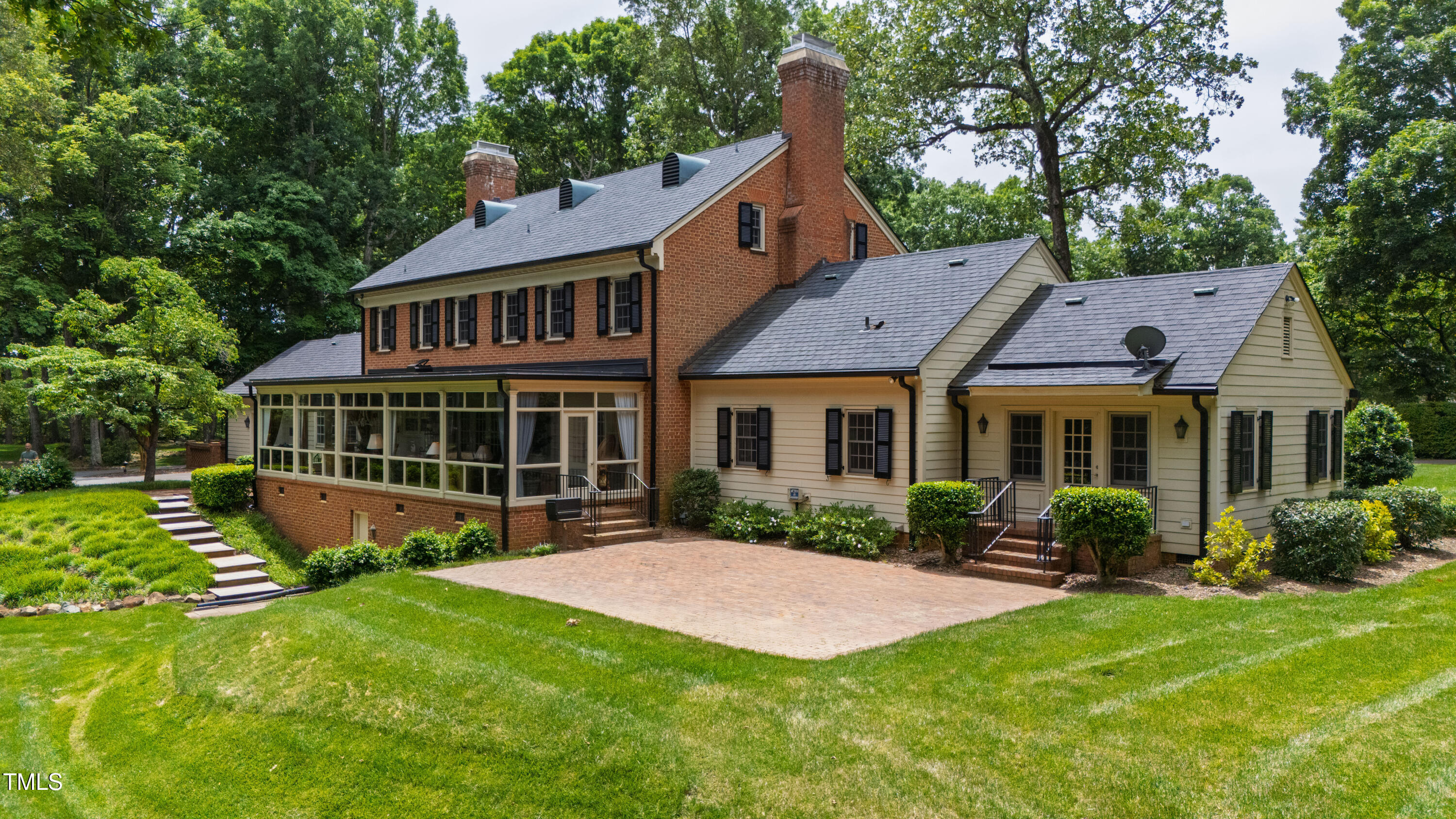 820.2 Kenmore Road Chapel Hill, NC 27514 - Photo 14 of 20 a view of a house with a yard and plants