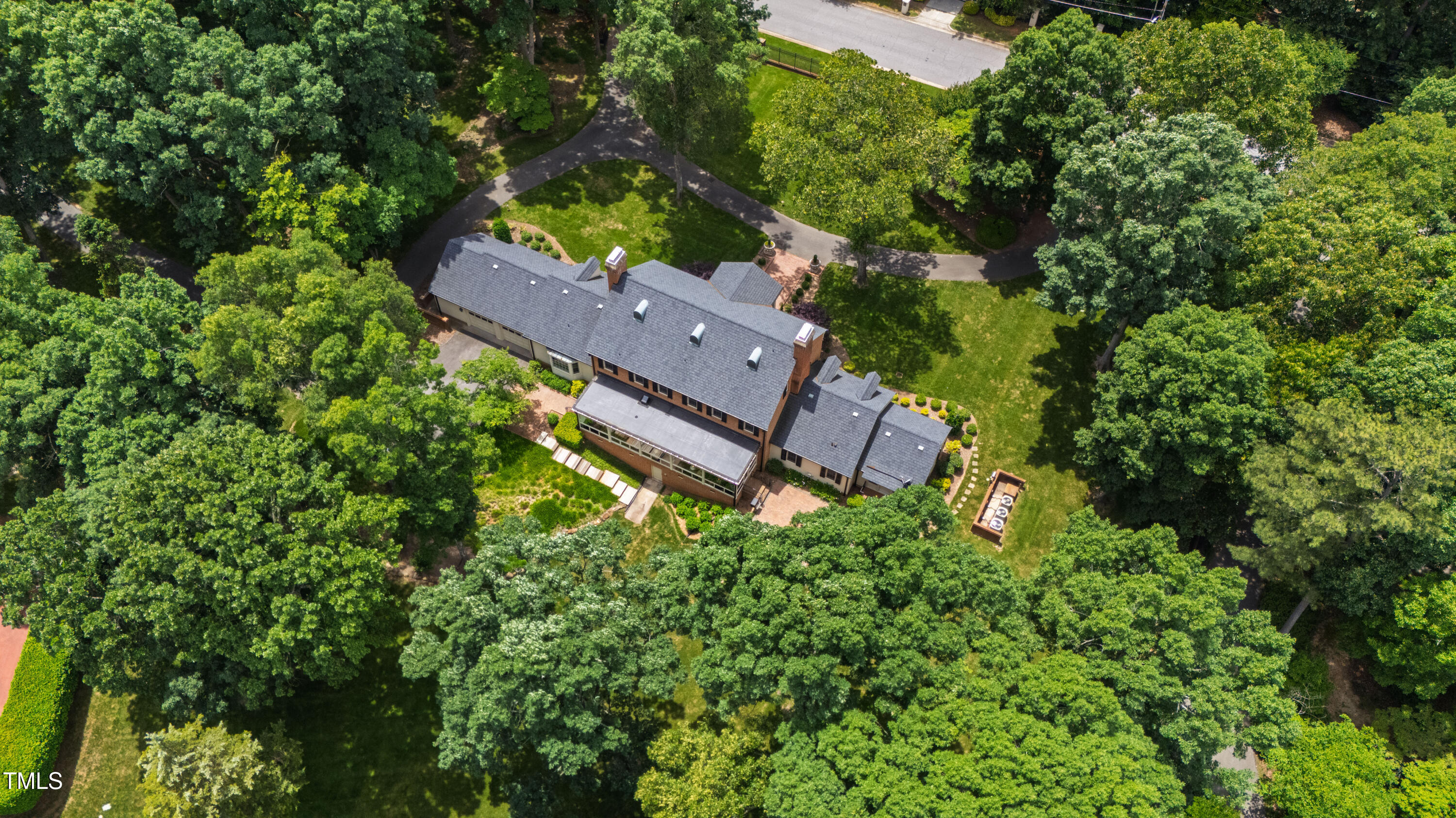 820.2 Kenmore Road Chapel Hill, NC 27514 - Photo 16 of 20 an aerial view of a house with a yard