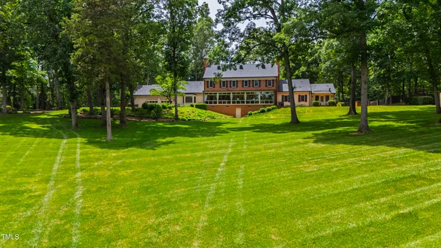 a view of a house with a big yard