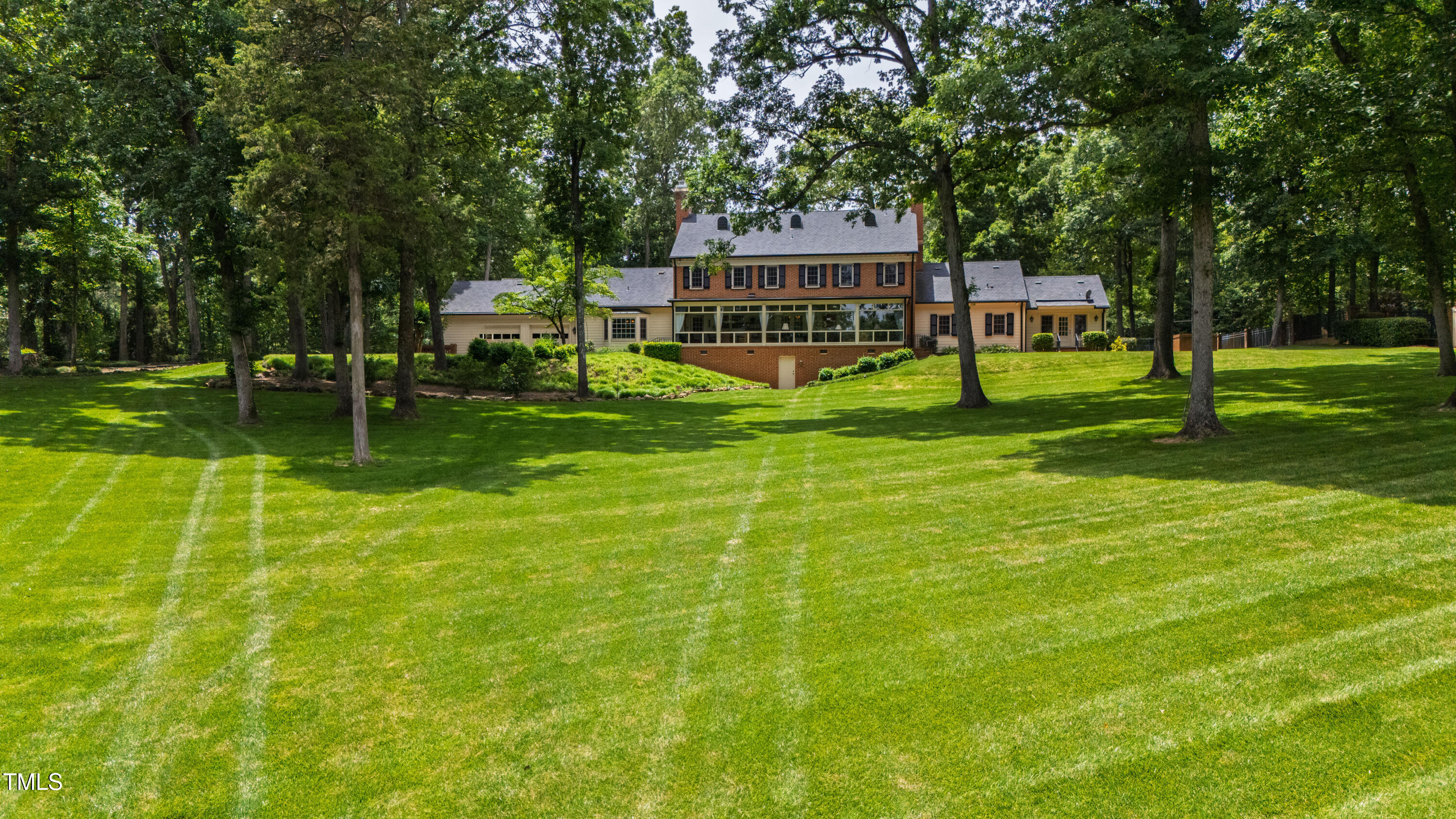 820.2 Kenmore Road Chapel Hill, NC 27514 - Photo 18 of 20 a view of a house with a big yard