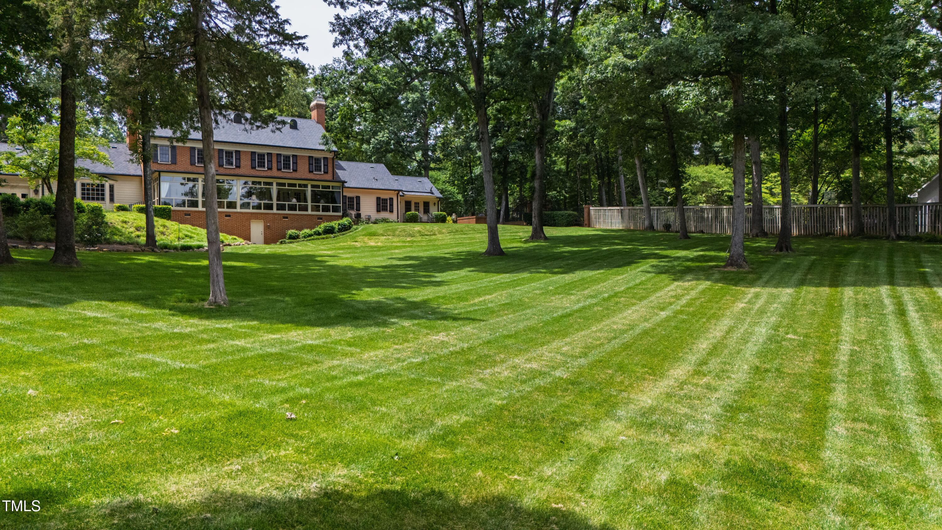 820.2 Kenmore Road Chapel Hill, NC 27514 - Photo 19 of 20 a view of a house with a backyard