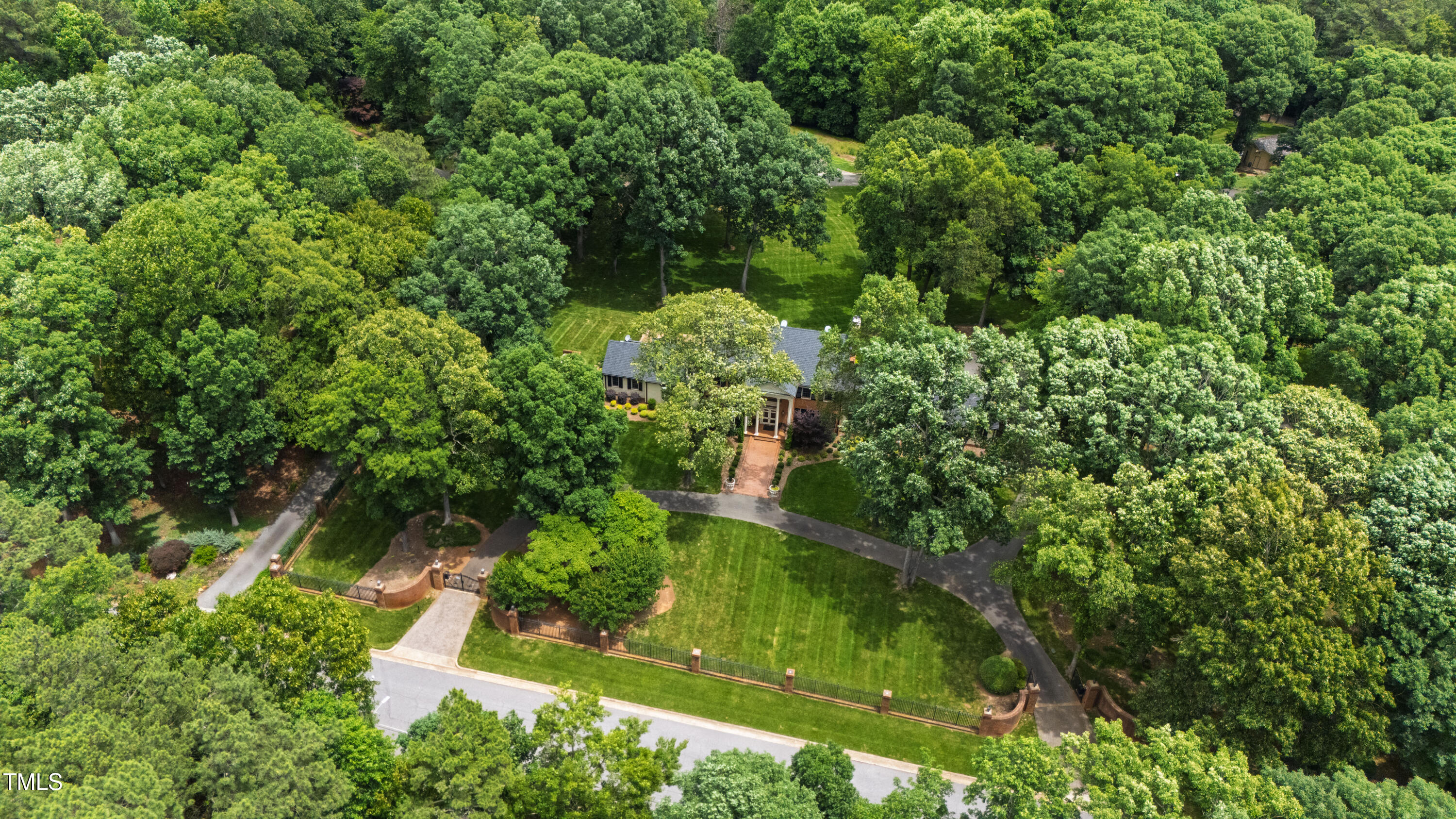 820.2 Kenmore Road Chapel Hill, NC 27514 - Photo 3 of 20 an aerial view of residential house with outdoor space and trees all around