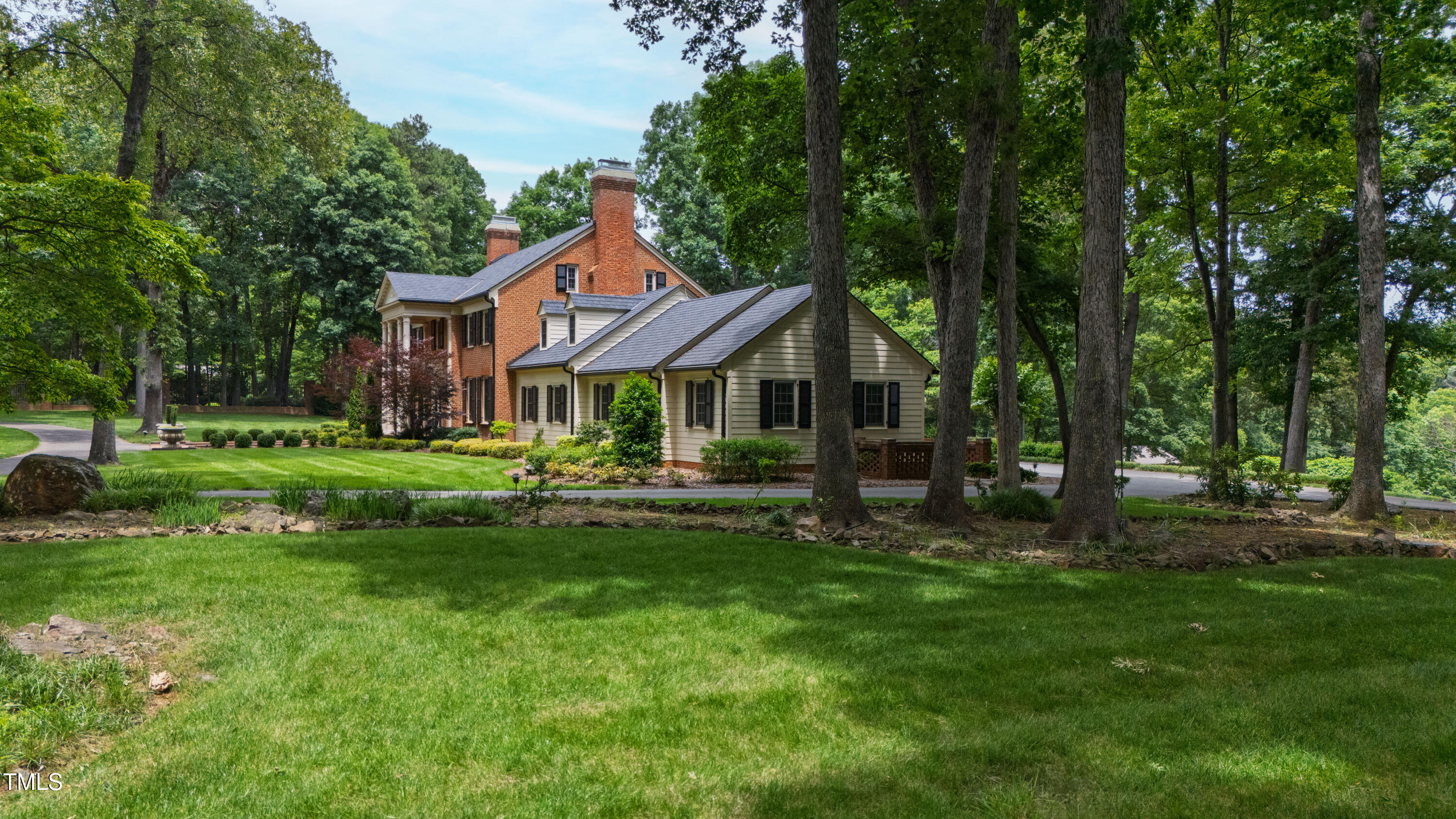 820.2 Kenmore Road Chapel Hill, NC 27514 - Photo 9 of 20 a front view of a house with yard and green space