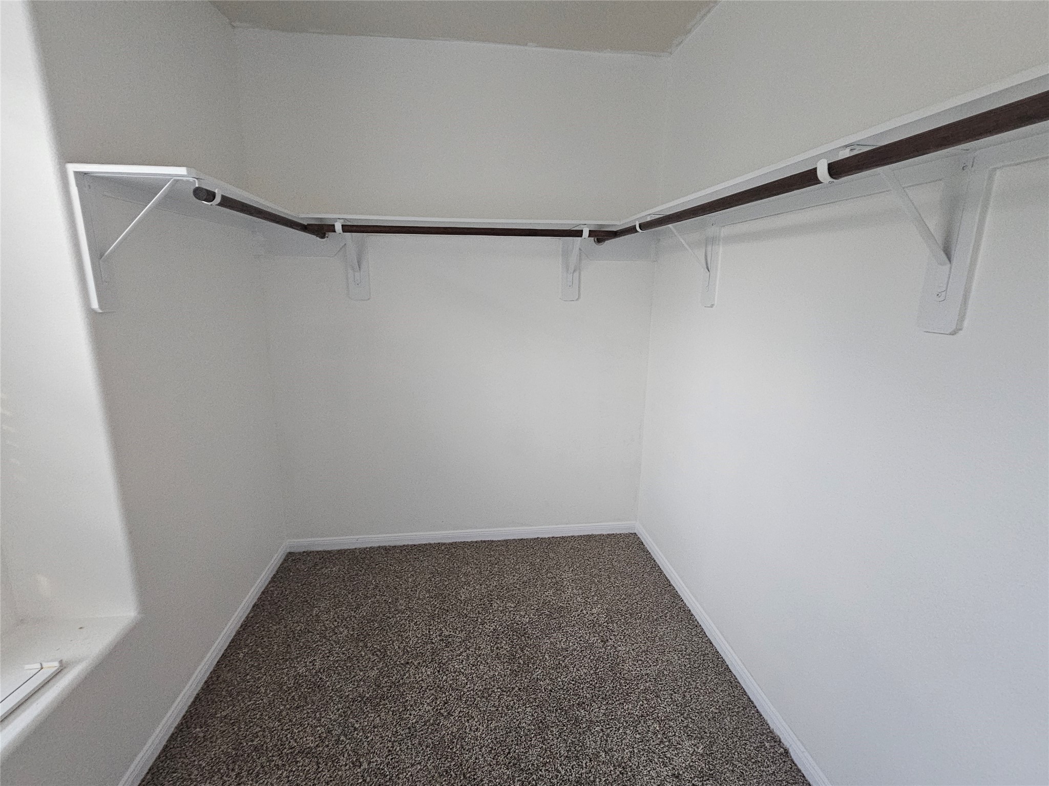 9938 Swallow Drive Conroe, TX 77385 - Photo 12 of 12 a view of a room with shelf