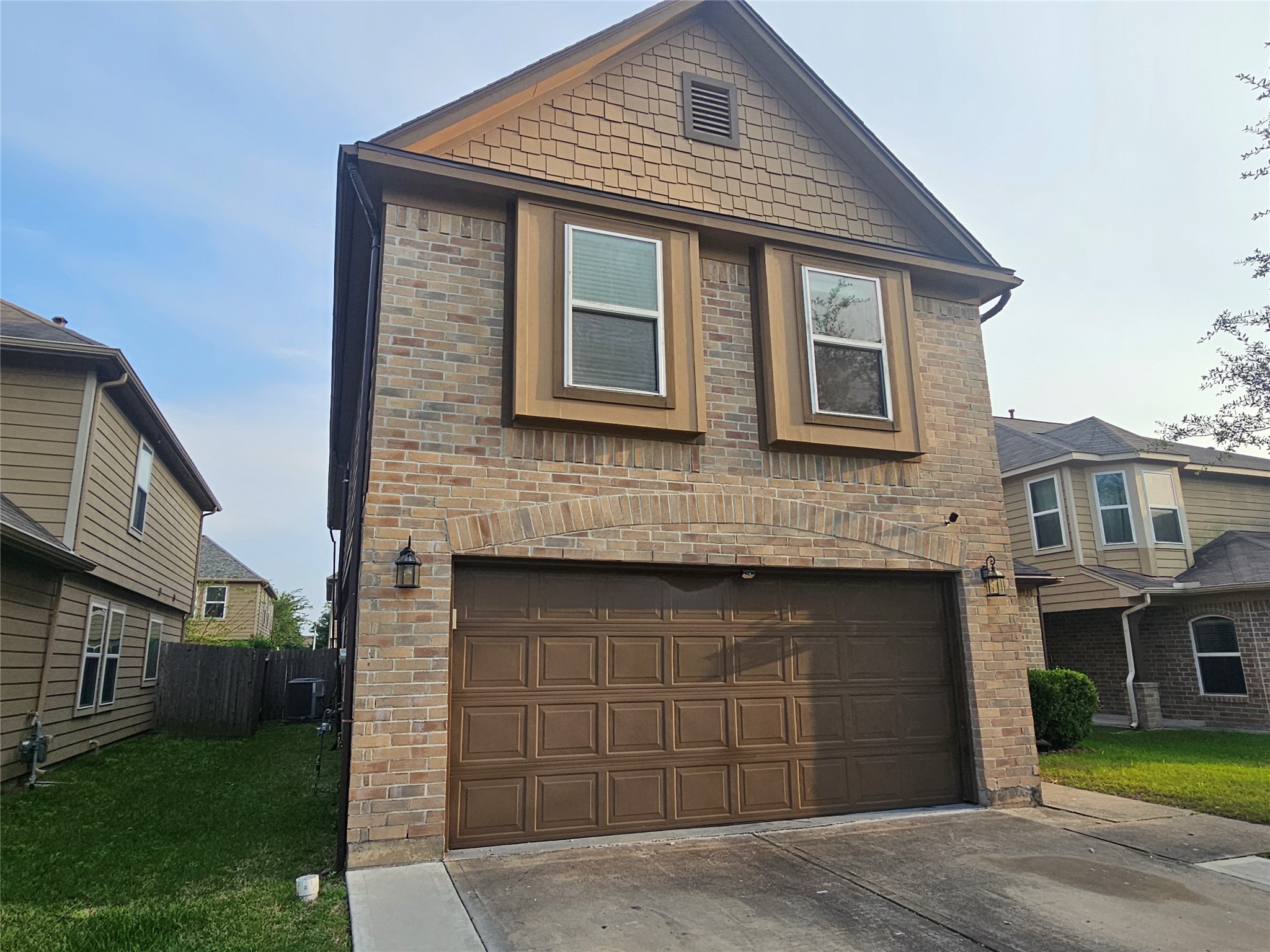9938 Swallow Drive Conroe, TX 77385 - Photo 2 of 12 a front view of a house with yard