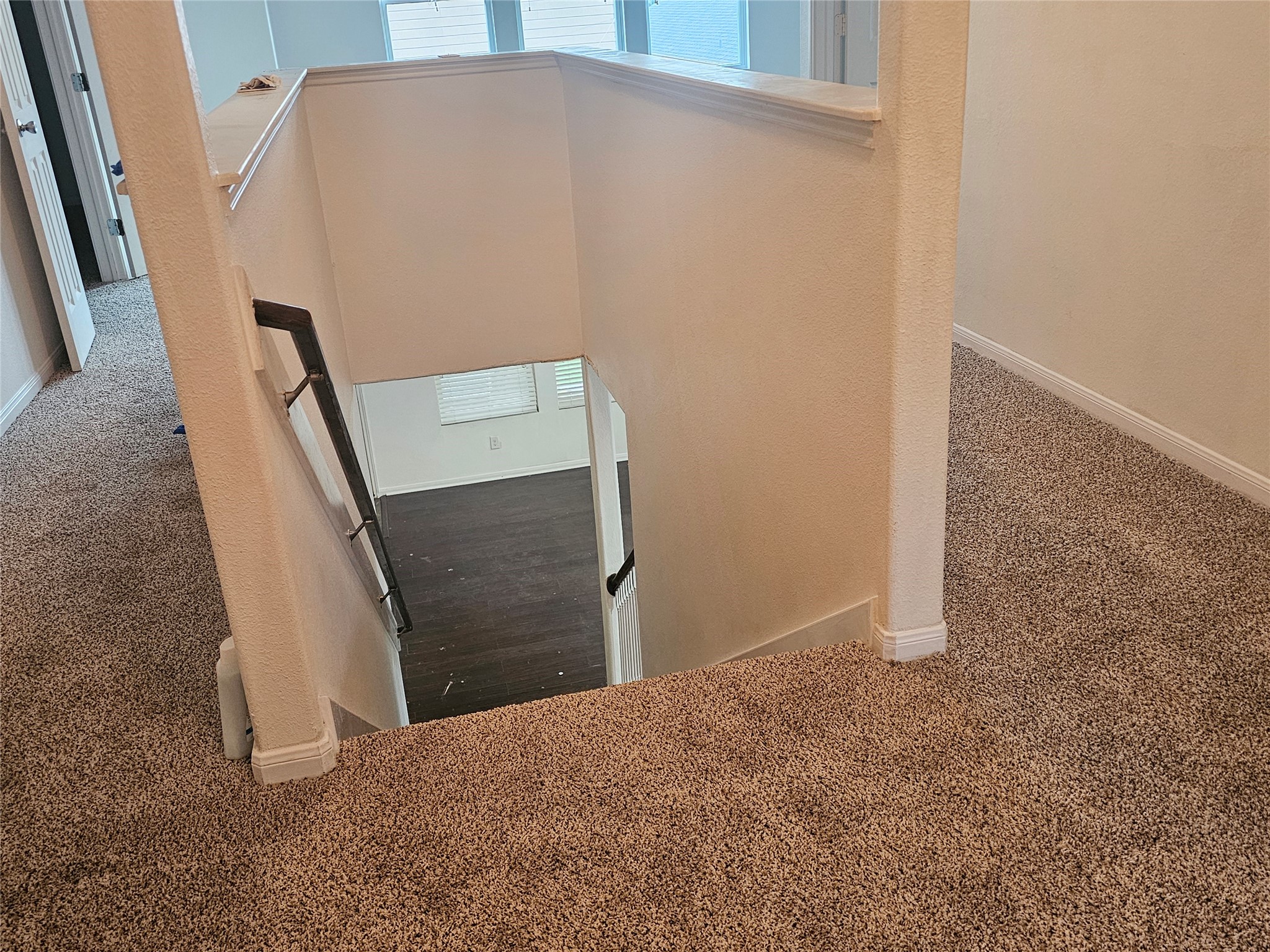 9938 Swallow Drive Conroe, TX 77385 - Photo 4 of 12 view of an empty room and stairs