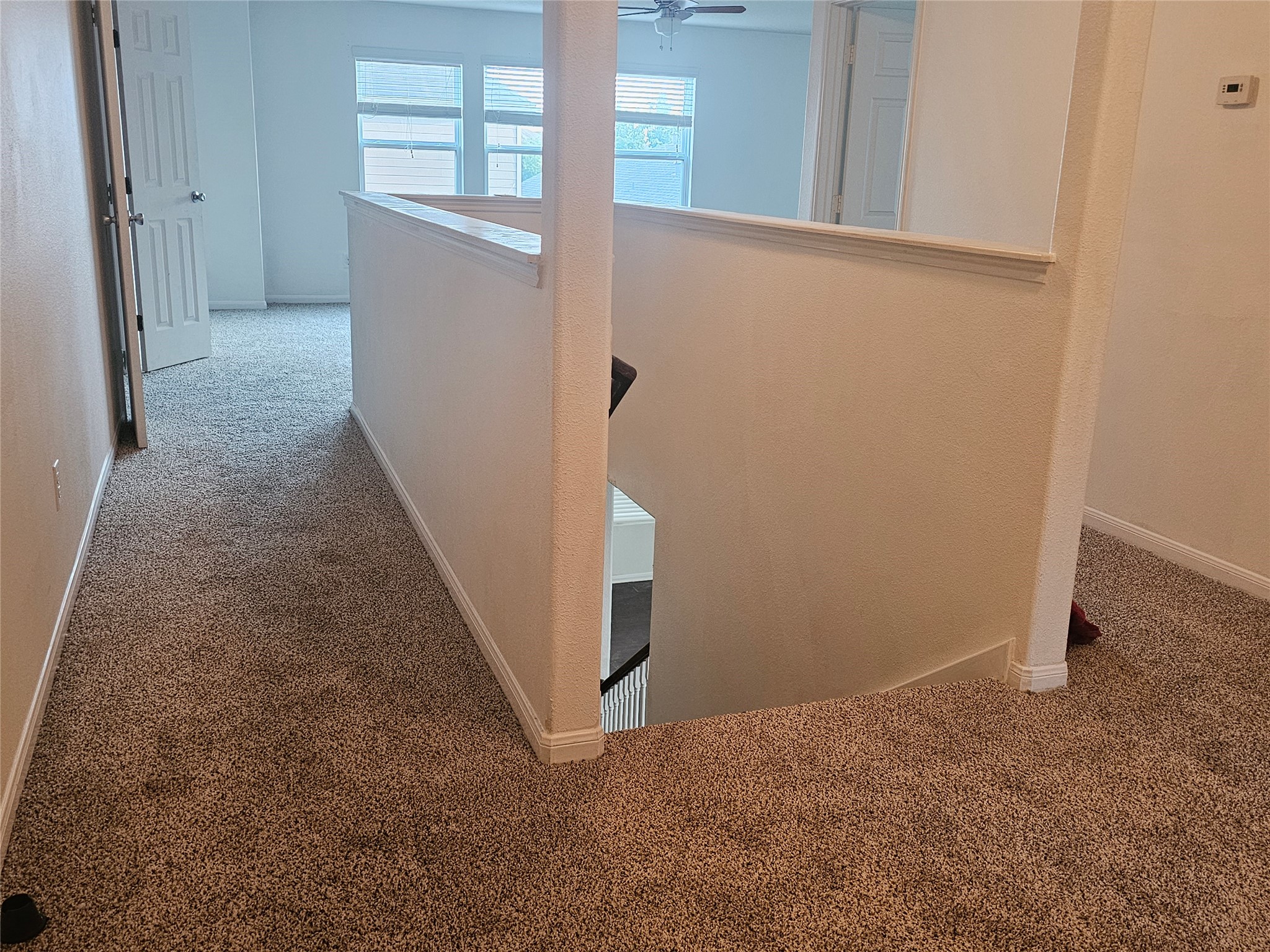 9938 Swallow Drive Conroe, TX 77385 - Photo 5 of 12 a view of a hallway to rooms