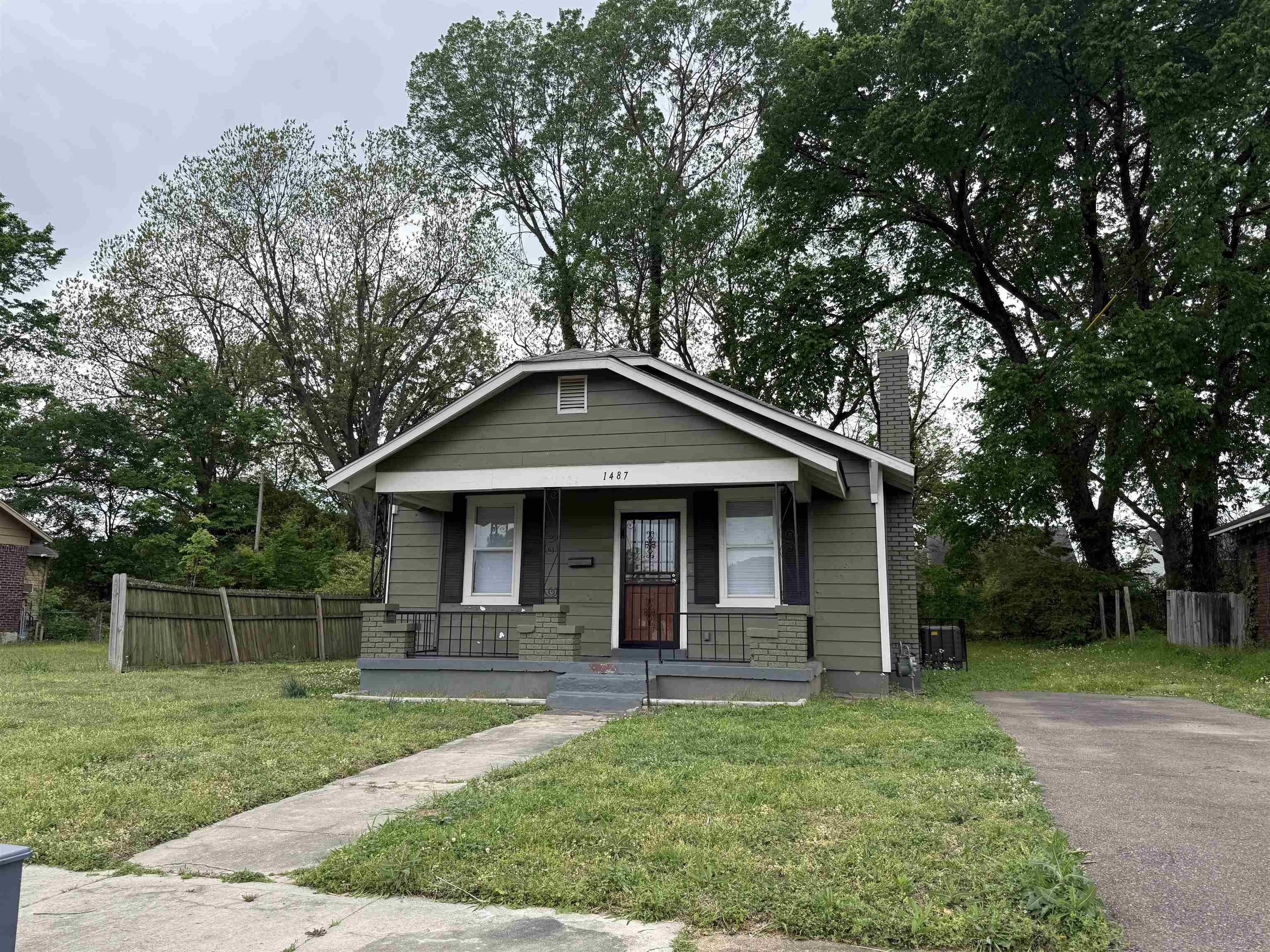 a front view of a house with yard