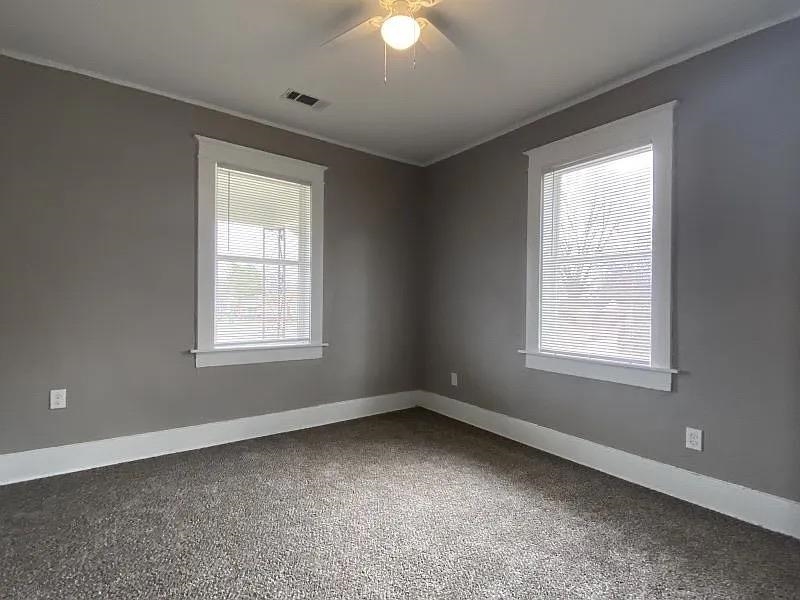 1487 Swift Street Memphis, TN 38109 - Photo 3 of 8 an empty room with a window