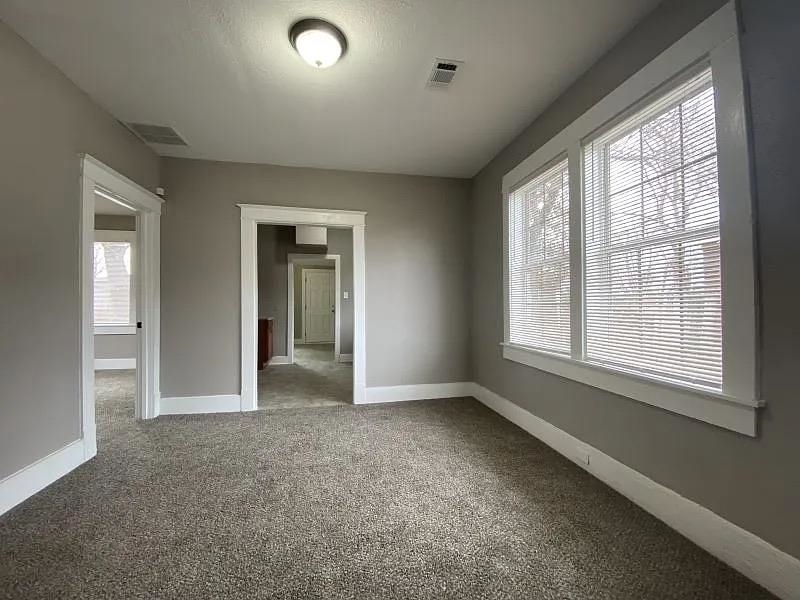 1487 Swift Street Memphis, TN 38109 - Photo 5 of 8 a view of an empty room with a window