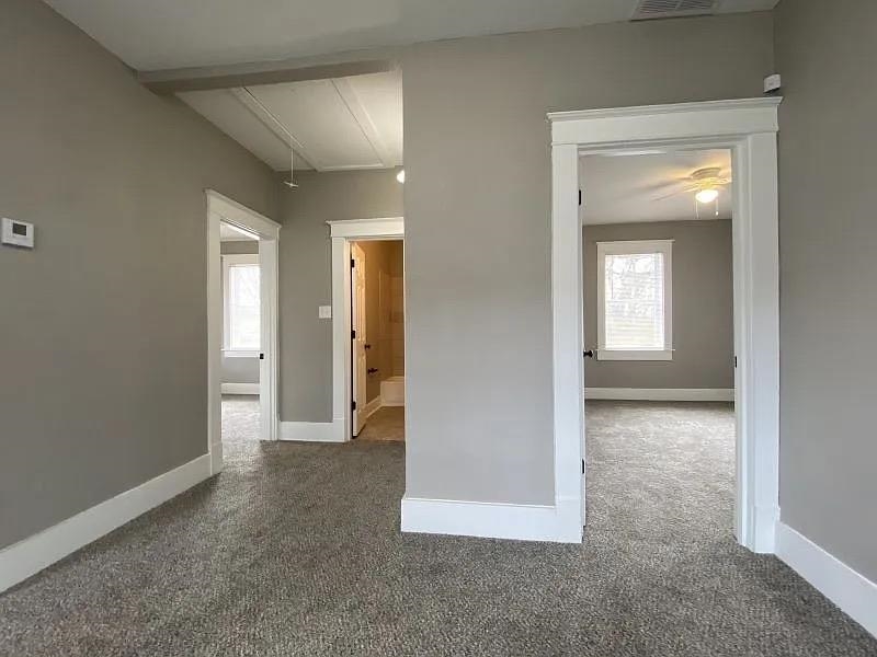 1487 Swift Street Memphis, TN 38109 - Photo 6 of 8 an empty room that has a window in it