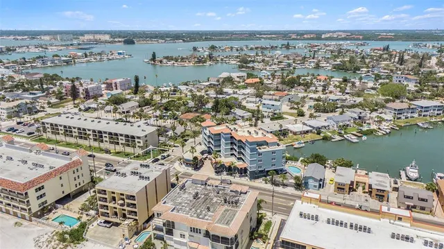 an aerial view of a houses with outdoor space