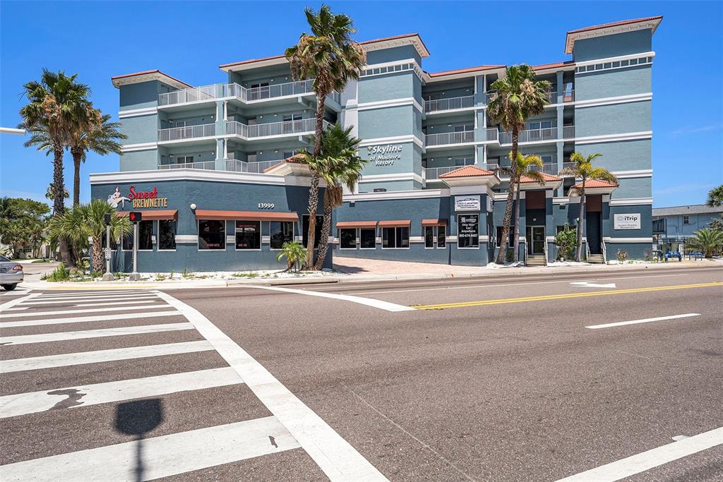 13999 Gulf Boulevard, Unit 406 St. Petersburg, FL 33708 - Photo 34 of 35 a view of building with street view