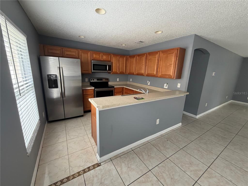2413 Ruddenstone Way Kissimmee, FL 34744 - Photo 8 of 33 Gallery Image 8