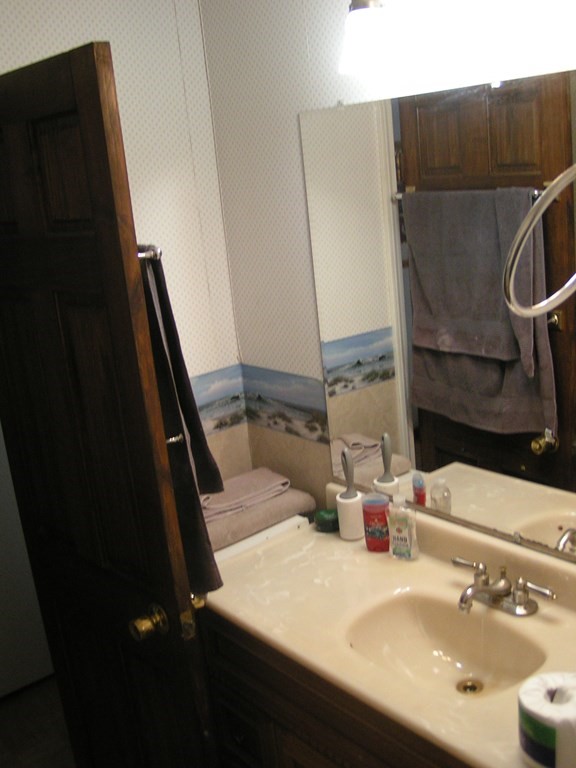 262 Anthony Street Fall River, MA 02721 - Photo 16 of 21 a bathroom with a sink and a mirror