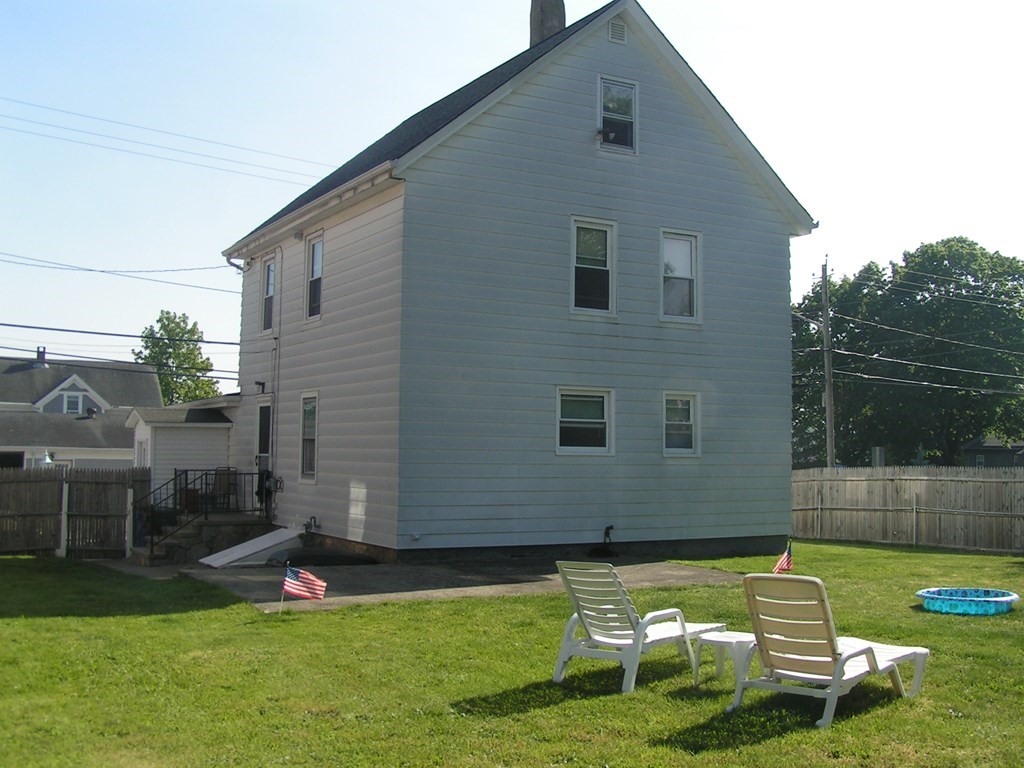 262 Anthony Street Fall River, MA 02721 - Photo 20 of 21 a backyard of a house with table and chairs