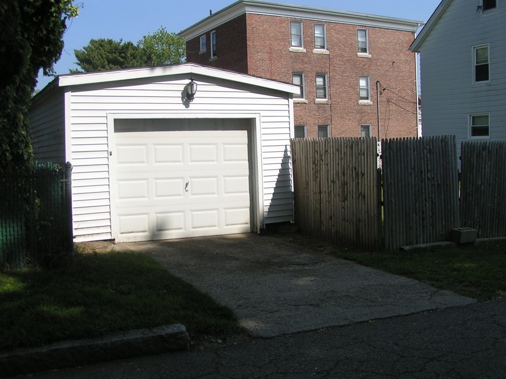 262 Anthony Street Fall River, MA 02721 - Photo 2 of 21 a front view of a house with a yard