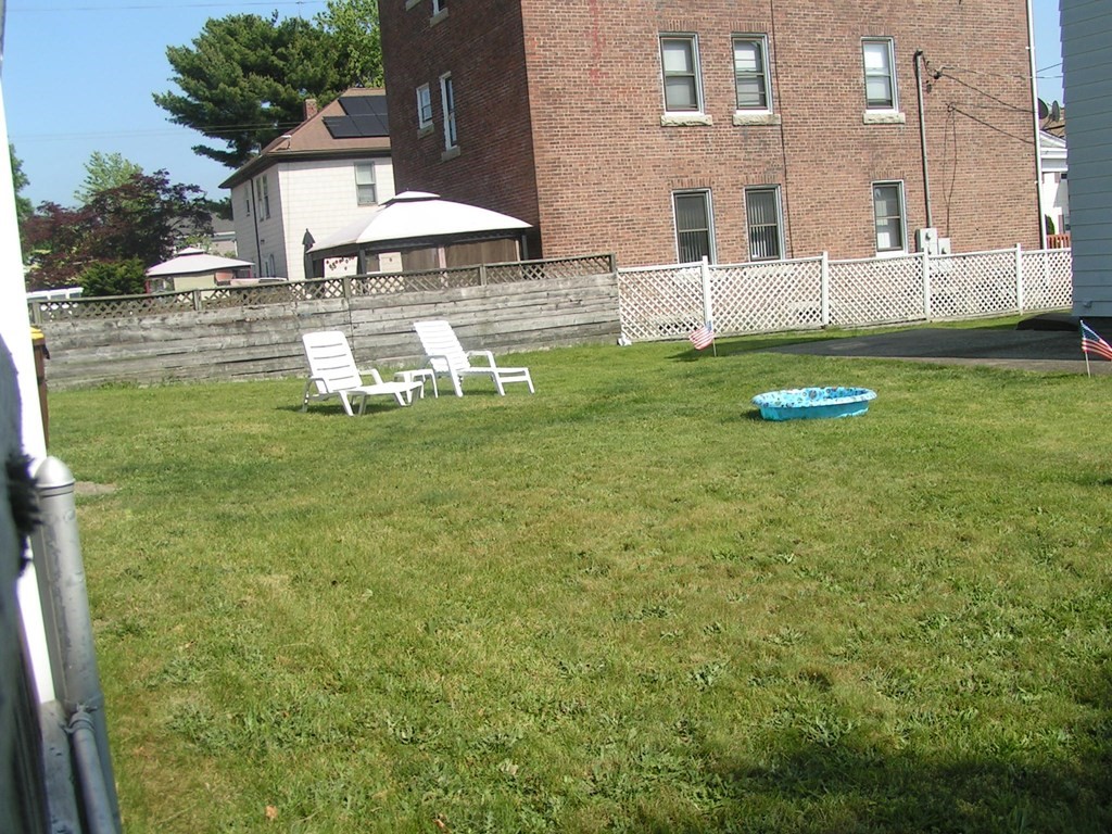 262 Anthony Street Fall River, MA 02721 - Photo 3 of 21 a view of a house with a yard and sitting area