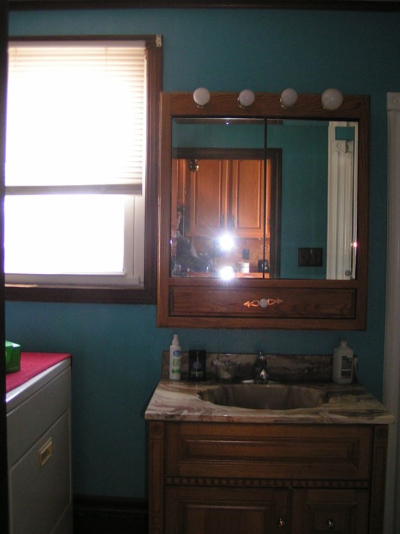 262 Anthony Street Fall River, MA 02721 - Photo 7 of 21 a bathroom with a sink and a mirror
