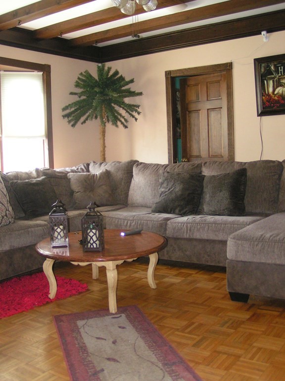 262 Anthony Street Fall River, MA 02721 - Photo 10 of 21 a living room with furniture and a couch