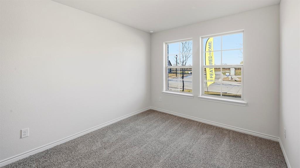 403 Flintlock Road Caddo Mills, TX 75135 - Photo 8 of 26 Spare room featuring carpet flooring and baseboards