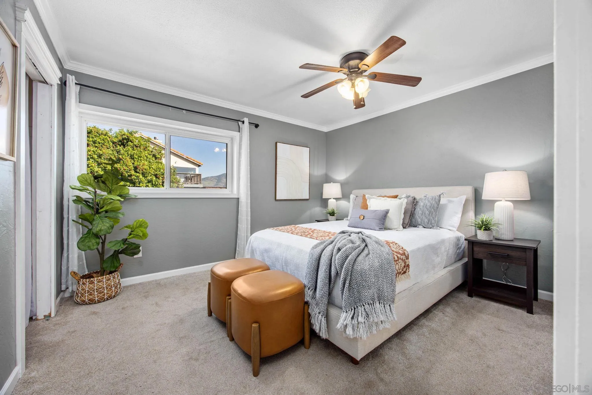 1311 Ramona Avenue Spring Valley, CA 91977 - Photo 12 of 33 a bedroom with a bed and a window