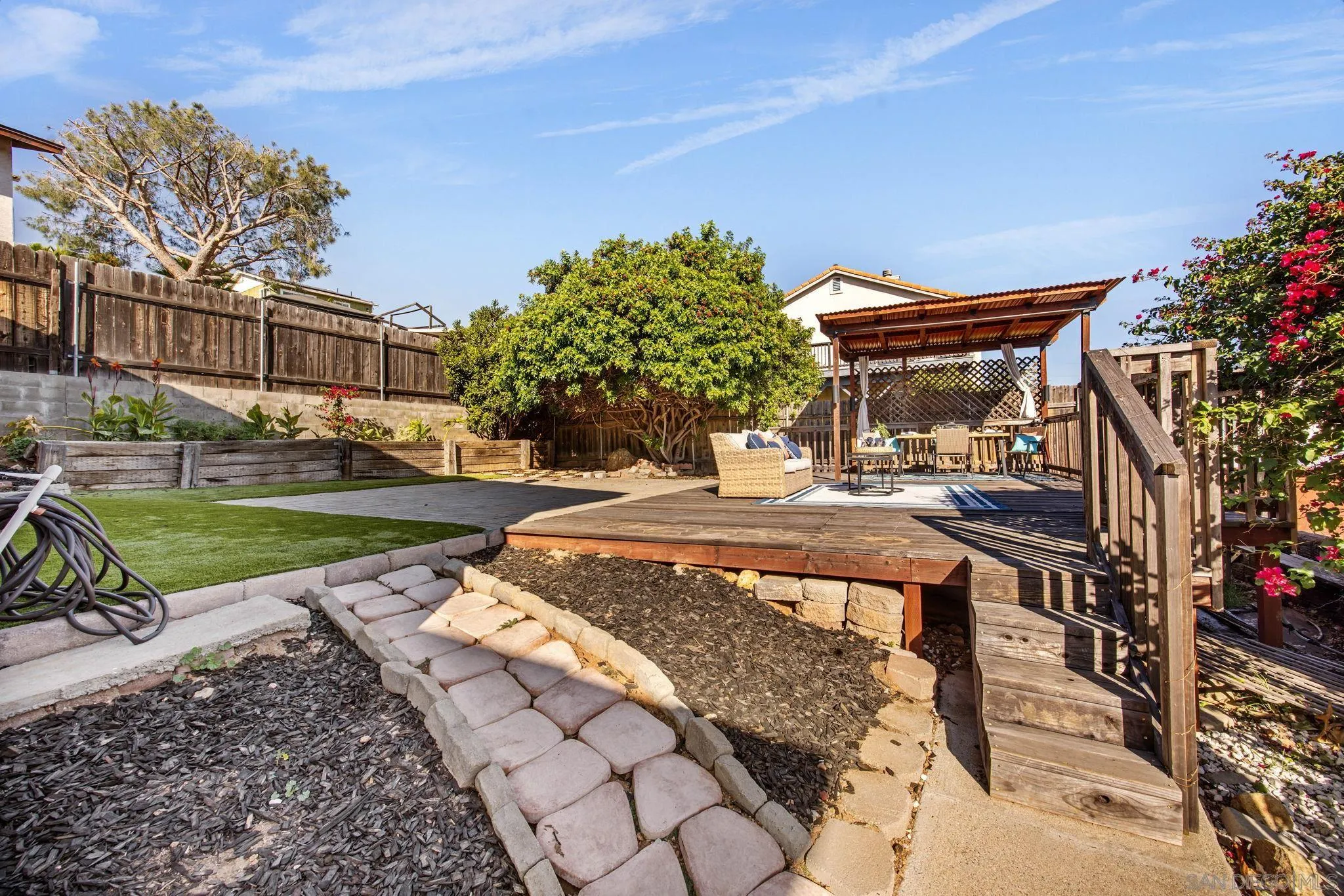 1311 Ramona Avenue Spring Valley, CA 91977 - Photo 28 of 33 a view of a yard with plants and trees
