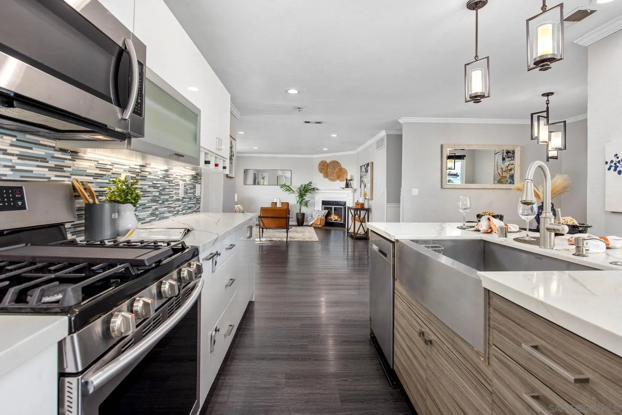 1311 Ramona Avenue Spring Valley, CA 91977 - Photo 6 of 33 a kitchen with stove and cabinets