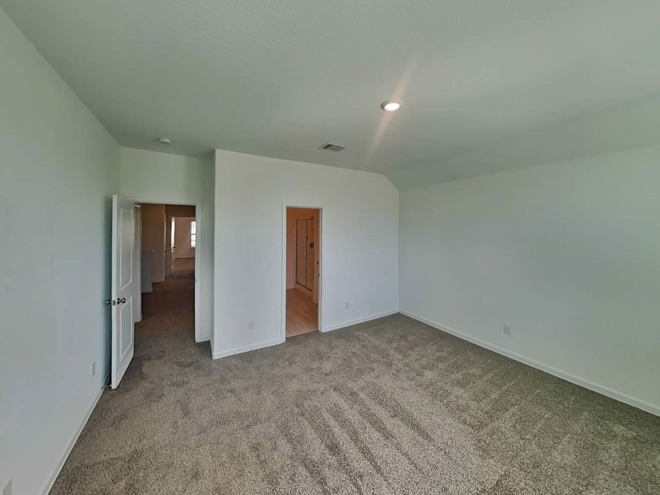 4026 Champlain Way Iowa Colony, TX 77583 - Photo 12 of 17 an empty room with closet and bathroom