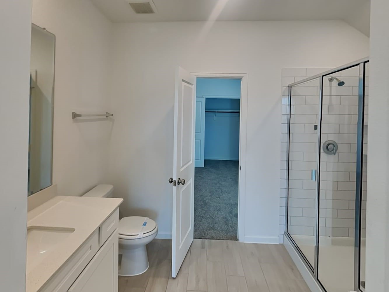 4026 Champlain Way Iowa Colony, TX 77583 - Photo 14 of 17 a bathroom with a toilet a sink and shower