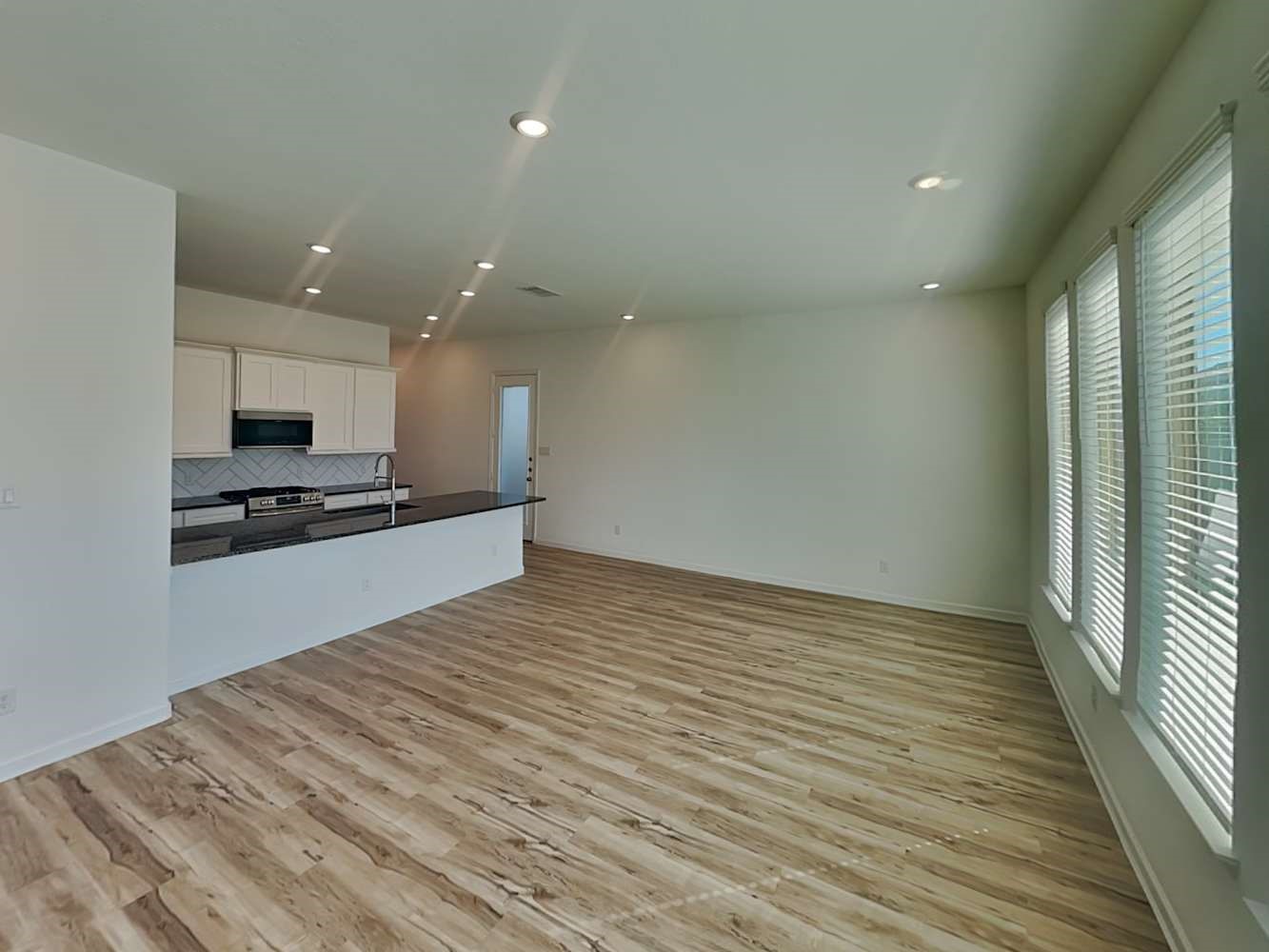 4026 Champlain Way Iowa Colony, TX 77583 - Photo 7 of 17 a view of kitchen with refrigerator and window