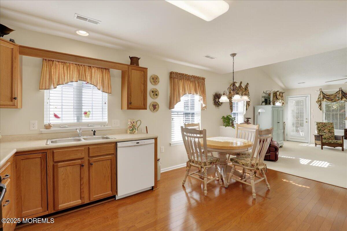 54 Merion Lane Jackson, NJ 08527 - Photo 16 of 46 a view of a dining room with furniture and wooden floor