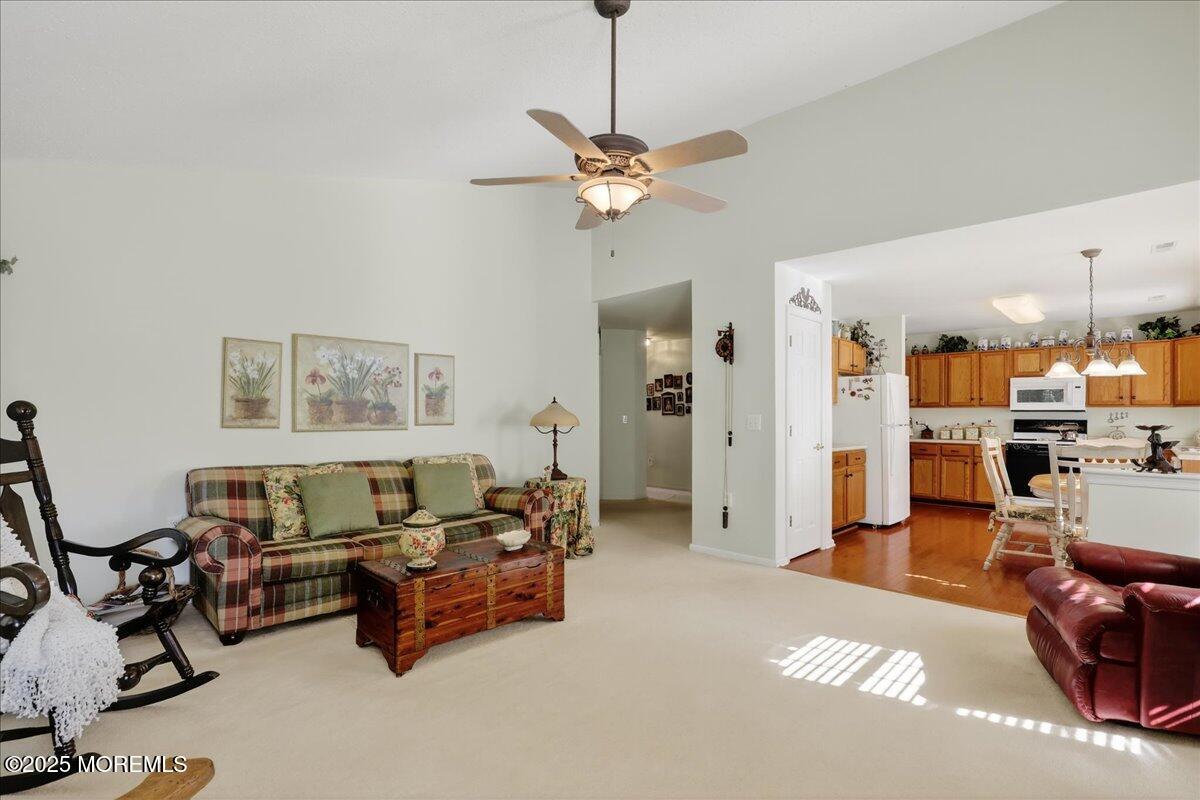 54 Merion Lane Jackson, NJ 08527 - Photo 20 of 46 a living room with furniture and a window