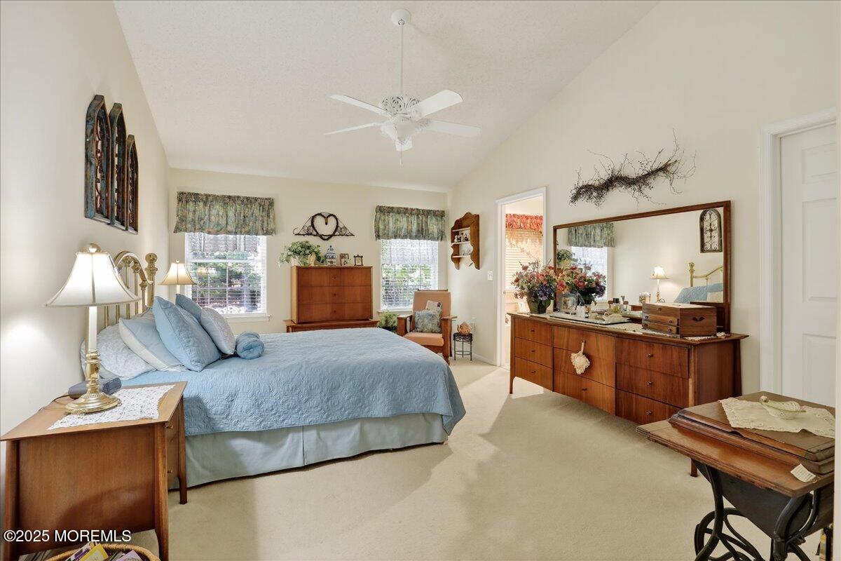 54 Merion Lane Jackson, NJ 08527 - Photo 22 of 46 a bedroom with a bed and dresser with mirror